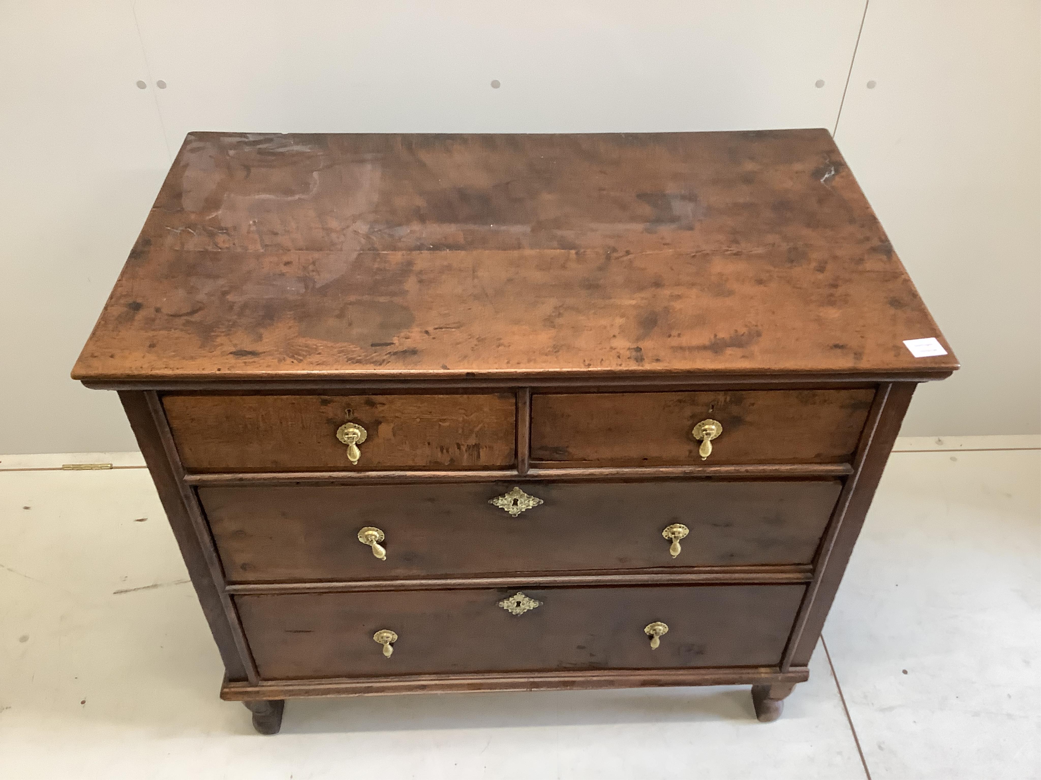 A late 18th century oak chest, fitted with two short and three long drawers, width 102cm, depth 58cm, height 88cm. Condition - fair